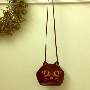 Two sided cat face over the shoulder bag